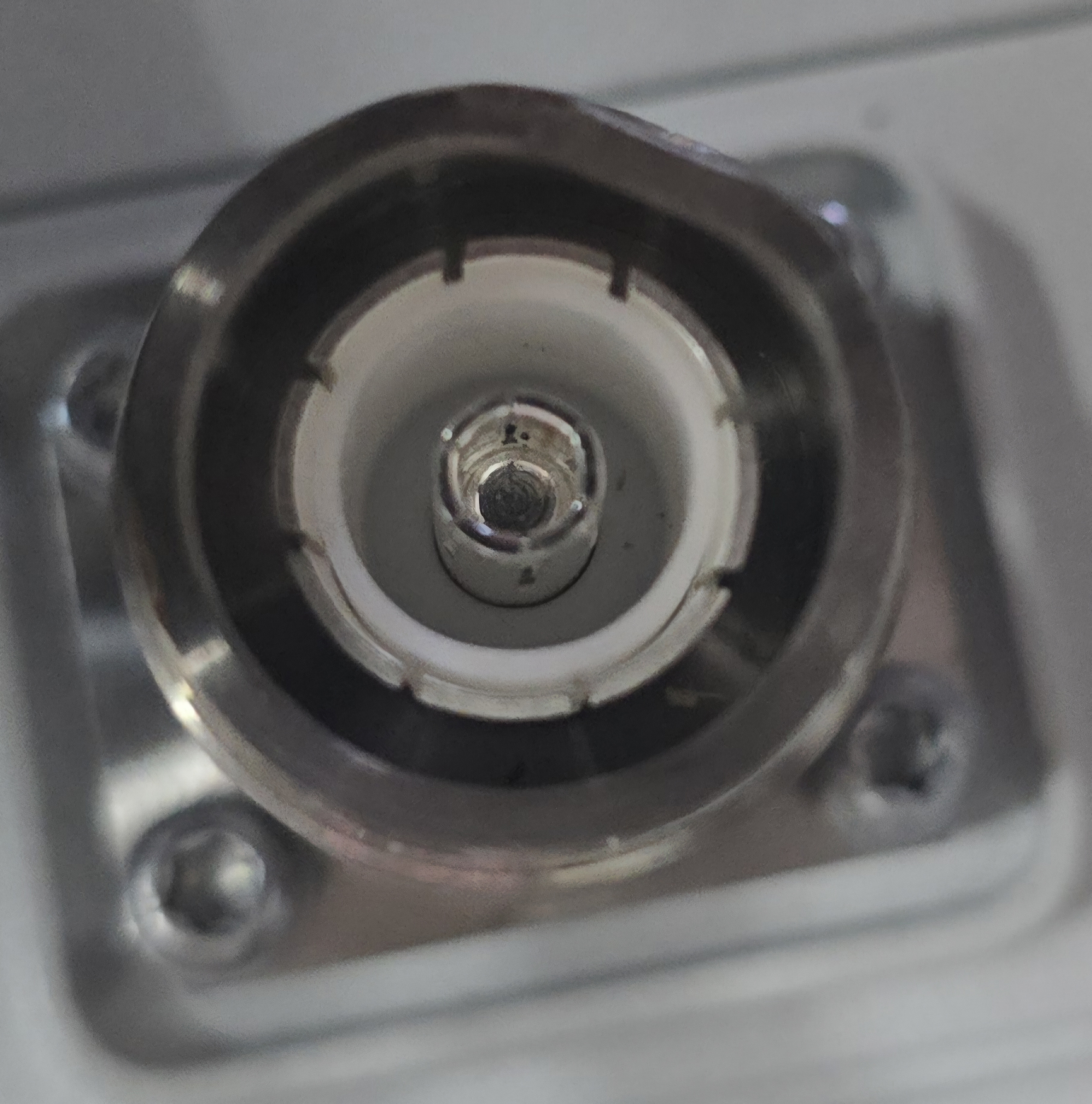 Damaged out-of-round 4.3-10 female port before RRU connector repair