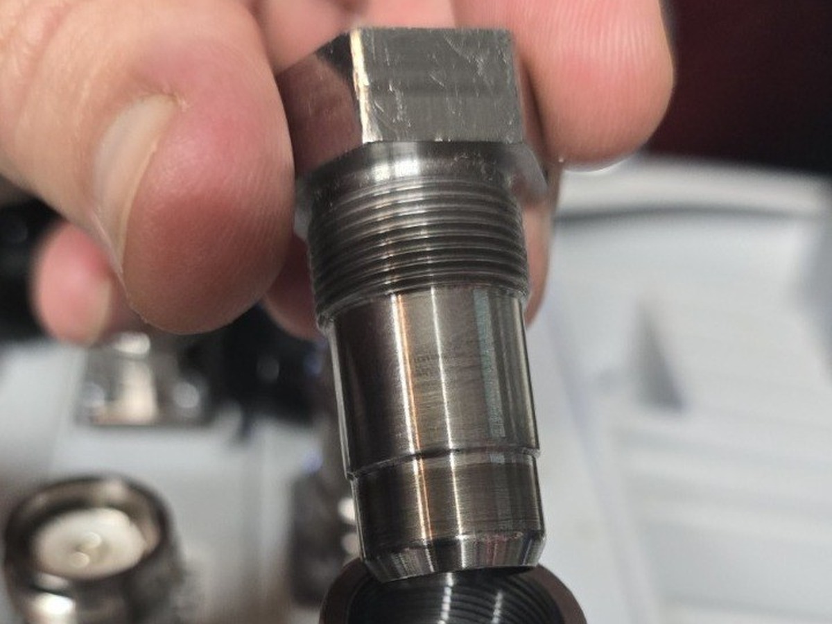 Reforming mandrel positioned above the installed guide collar